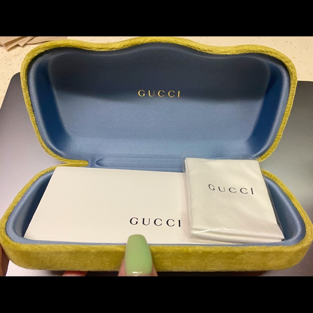 Brand new Gucci hard eyeglass case.